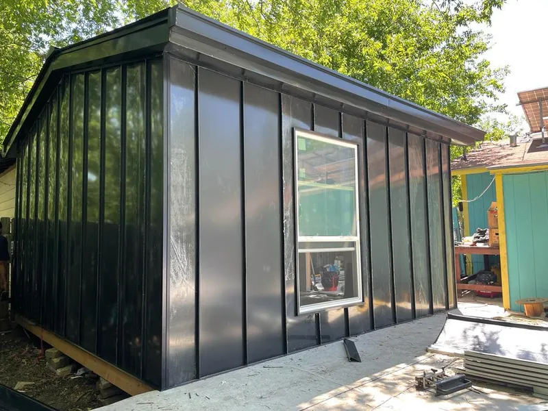 Black standing seam metal wall panels for Metal Roof Installation in McComb