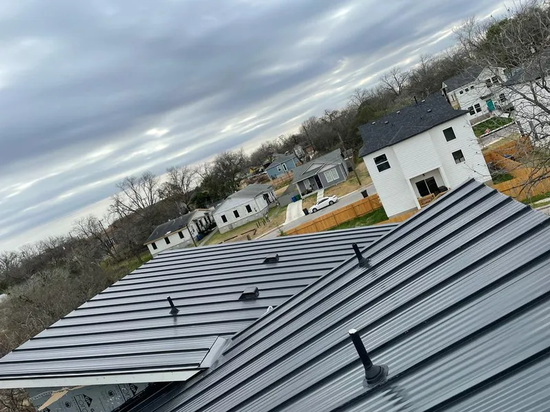 Standing seam metal roof panels with vents for Skylight Repair in McComb